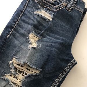 Silver jeans, with lace down the legs